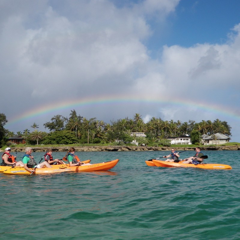 A group of people Kayaking